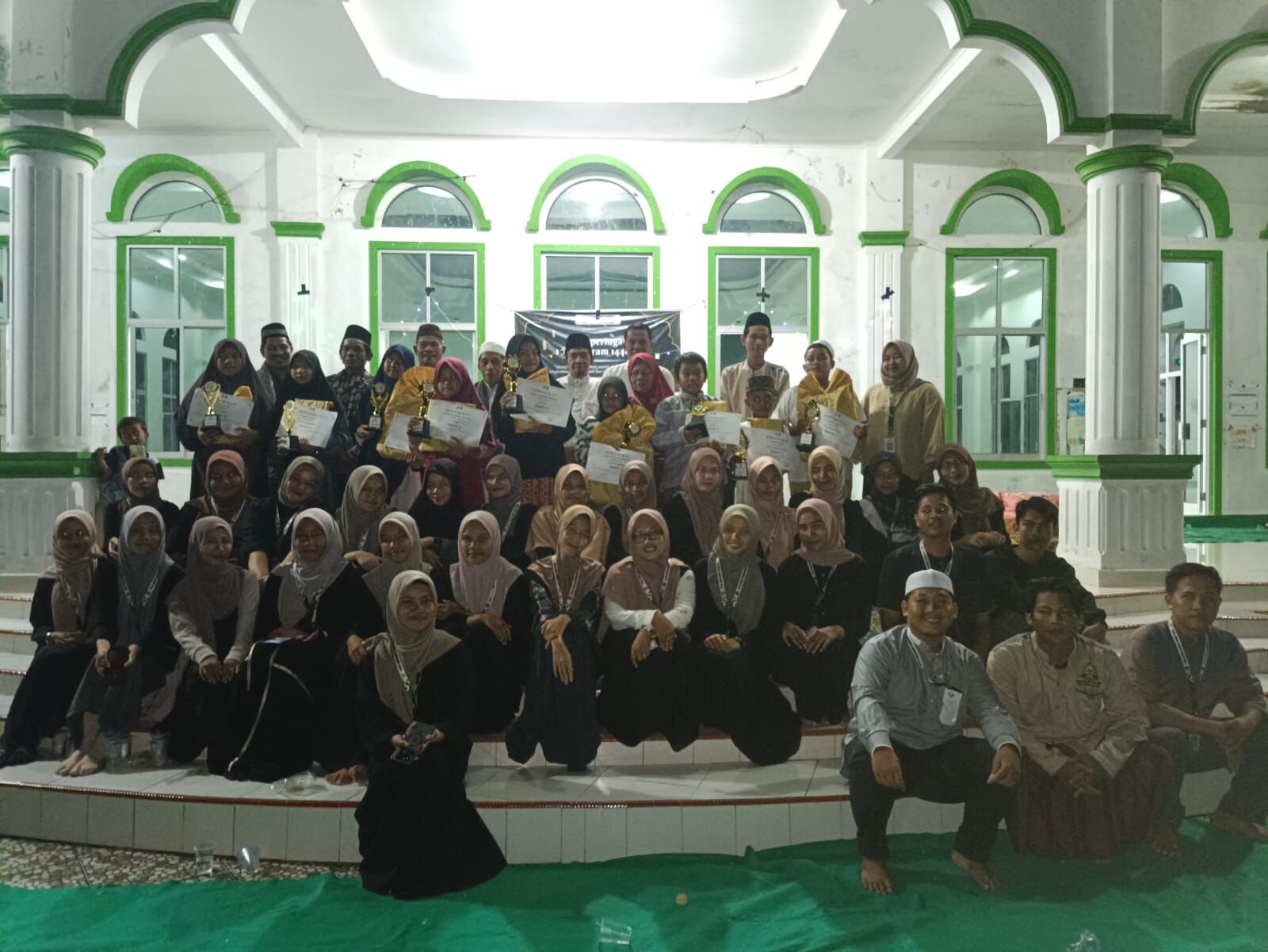 Mahasiswa KKN Sukseskan Kegiatan Perlombaan 1 Muharram 1446 H di Desa Simpang Tiga